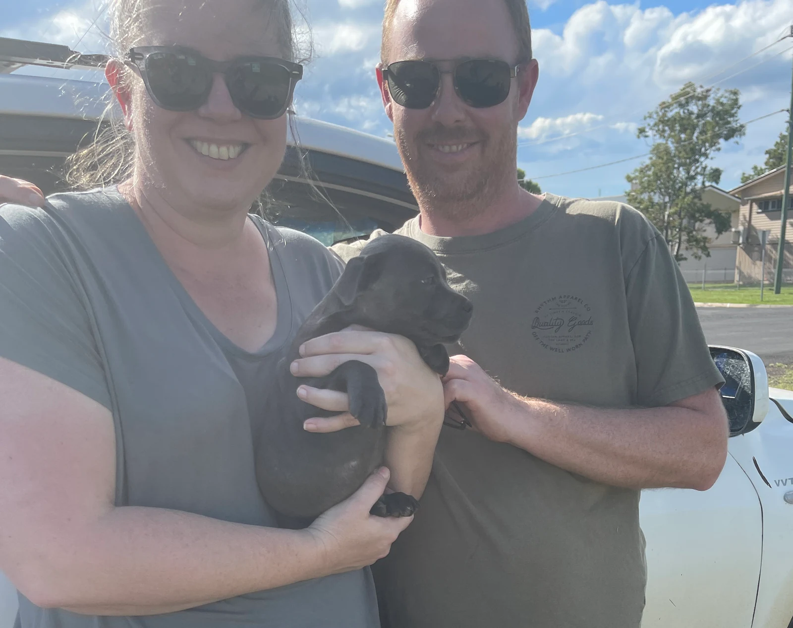 Malinda and her partner bringing puppy Wilfrid home